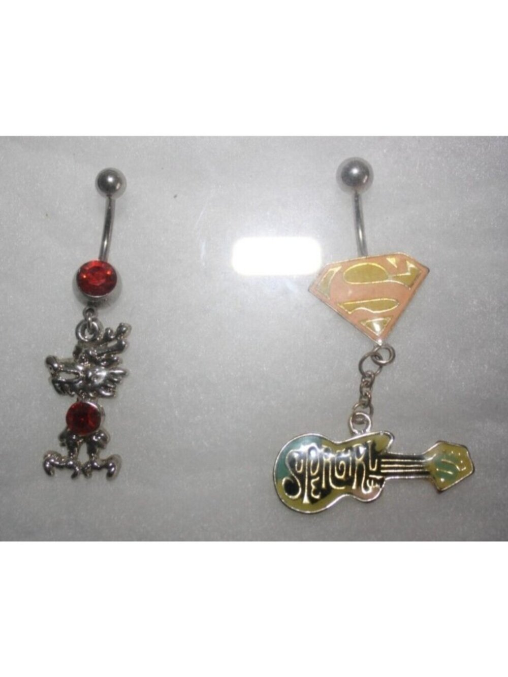 Dragon & Super Girl Belly Rings Set (2) Stainless Steel Red Pink Guitar NWT